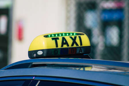 Reims France February 27, 2021 Taxi for passengers rolling in the streets of Reims during the coronavirus pandemic affecting Franceのeditorial素材