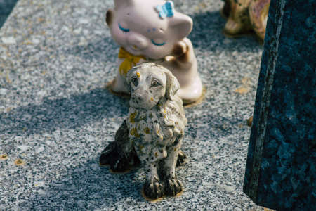 Reims France March 03, 2021 Religious objects of memories placed on the graves in the cemetery of the city of Reims during the coronavirus pandemic hitting Franceのeditorial素材