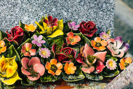 Reims France March 03, 2021 Religious objects of memories placed on the graves in the cemetery of the city of Reims during the coronavirus pandemic hitting Franceのeditorial素材