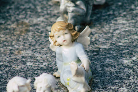 Reims France March 03, 2021 Religious objects of memories placed on the graves in the cemetery of the city of Reims during the coronavirus pandemic hitting Franceのeditorial素材