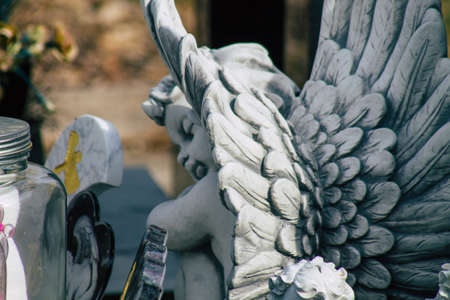 Reims France March 03, 2021 Religious objects of memories placed on the graves in the cemetery of the city of Reims during the coronavirus pandemic hitting Franceのeditorial素材
