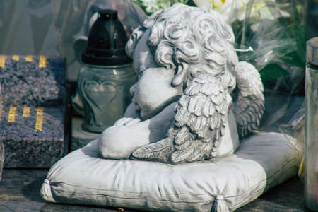 Reims France March 03, 2021 Religious objects of memories placed on the graves in the cemetery of the city of Reims during the coronavirus pandemic hitting Franceのeditorial素材