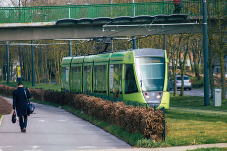 Reims France March 03, 2021 Modern electric tram for passengers rolling through the streets of Reims during the coronavirus outbreak hitting Franceのeditorial素材