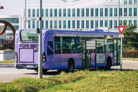 Reims France March 10, 2021 City bus for passengers driving through the streets during coronavirus outbreak hitting France and part of the public transport system of Reimsのeditorial素材