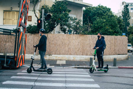 Tel Aviv Israel March 02, 2021 Unidentified people rolling through the streets of Tel Aviv during the Coronavirus outbreak hitting Israelのeditorial素材
