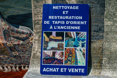 Reims France March 20, 2021 Handmade oriental carpets old at the flea market in downtown during the Coronavirus outbreak hitting Franceのeditorial素材