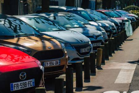 Reims France March 29, 2021 Various cars parked in the town of Reims because people stay at home during the pandemic affecting Franceのeditorial素材