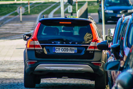 Reims France March 29, 2021 Taxi for passengers rolling in the streets of Reims during the coronavirus pandemic affecting Franceのeditorial素材