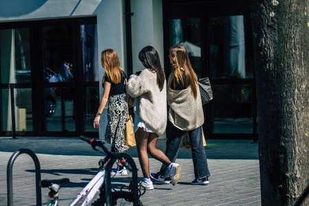 Reims France April 1, 2021 Pedestrians with a face mask to protect themself from the coronavirus walking in the streets of Reims during Coronavirus pandemic affecting Franceのeditorial素材