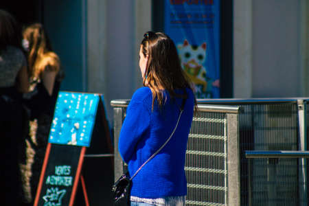 Reims France April 1, 2021 Pedestrians with a face mask to protect themself from the coronavirus walking in the streets of Reims during Coronavirus pandemic affecting Franceのeditorial素材