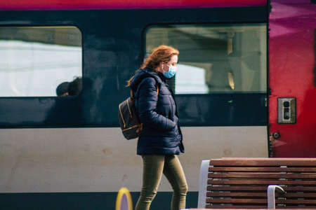 Reims France February 27, 2021 Passengers at the Central train station located in downtown of Reims during the Coronavirus outbreak hitting Franceのeditorial素材