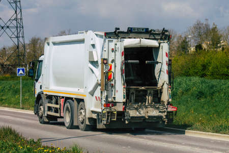 Reims France April 15, 2021 Garbage truck driving through the streets of Reims during the outbreak...