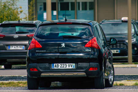 Reims France April 15, 2021 Peugeot car parked in the streets of Reimsのeditorial素材