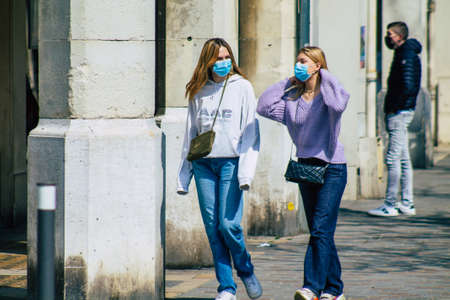 Reims France April 19, 2021 Pedestrians walking in the streets of Reims during the coronavirus outbreak hitting Franceのeditorial素材