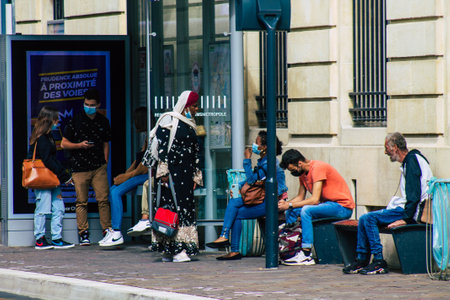 Reims France May 28, 2021 Passengers at the tram station in the city of Reims during the coronavirus...