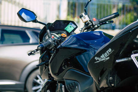 Reims France May 29, 2021 Closeup of the mechanics of a motorcycle parked in a parking lot located...
