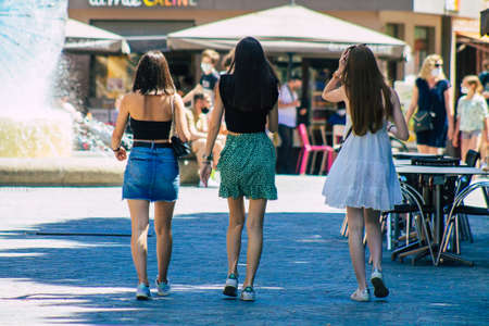 Reims France June 11, 2021 Pedestrians walking in the streets of Reims during the coronavirus outbreak hitting France, wearing a mask in the street is mandatoryのeditorial素材