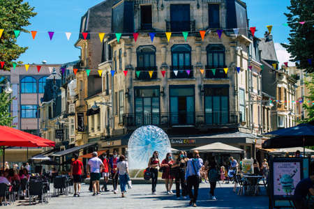 Reims France June 11, 2021 Pedestrians walking in the streets of Reims during the coronavirus outbreak hitting France, wearing a mask in the street is mandatoryのeditorial素材