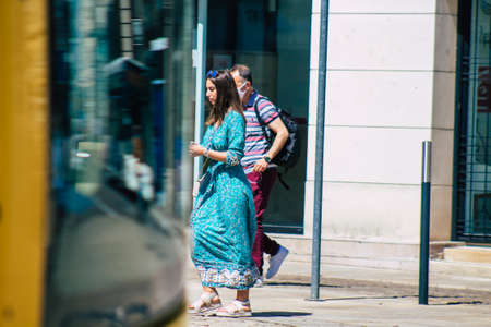 Reims France June 11, 2021 Pedestrians walking in the streets of Reims during the coronavirus outbreak hitting France, wearing a mask in the street is mandatoryのeditorial素材