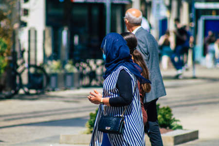 Reims France June 11, 2021 Pedestrians walking in the streets of Reims during the coronavirus outbreak hitting France, wearing a mask in the street is mandatoryのeditorial素材