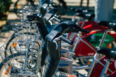Seville Spain July 01, 2021 Accessible bicycles to hire for short periods of time, usually for a few...