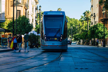 Seville Spain July 02, 2021 Modern electric tram for passengers rolling through the streets of...