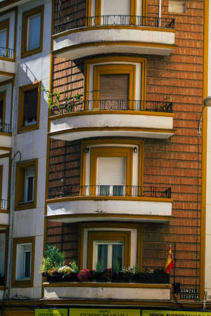 Seville Spain July 02, 2021 Facade of a building in the streets of Seville, an emblematic city and the capital of the region of Andalusia, in the south of Spainのeditorial素材
