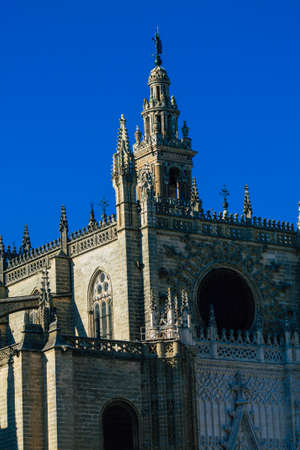 Seville Spain July 02, 2021 Saint Metropolitan and Patriarchal Cathedral Church of Santa MarÃ­a de la Sede de Sevilla, detail of the exterior facade, It is the largest Gothic cathedral in the worldのeditorial素材
