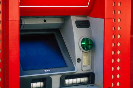 Seville Spain July 03, 2021 ATM located in the streets of Seville, an emblematic city and the capital of the region of Andalusia, in the south of Spainの写真素材