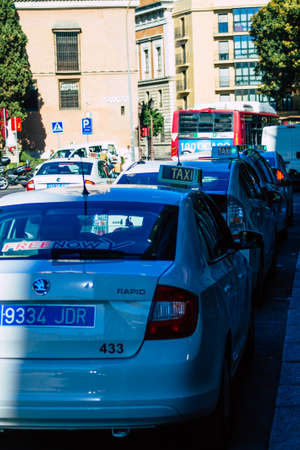 Seville Spain July 05, 2021 Taxi driving through the streets of Seville, an emblematic city and the capital of the region of Andalusia, in the south of Spainの写真素材