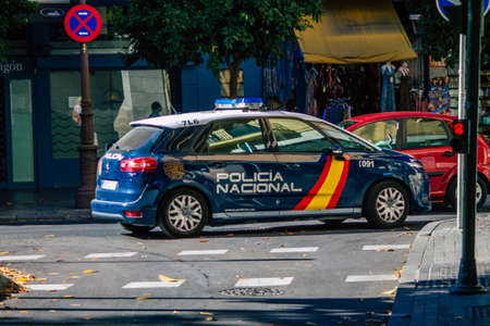 Seville Spain July 05, 2021 Police car patrolling in the streets of Seville, an emblematic city and the capital of the region of Andalusia, in the south of Spainの写真素材