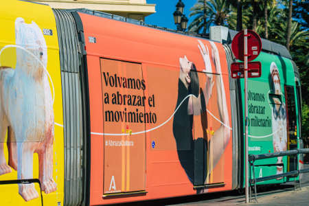Seville Spain July 06, 2021 Modern electric tram for passengers rolling through the streets of...