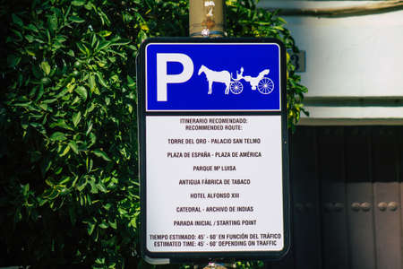 Seville Spain July 06, 2021 Street sign or road sign, erected at the side of or above roads to provide information to road user in the downtown area of Sevilleの写真素材