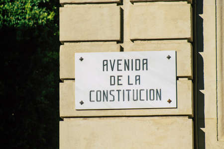 Seville Spain July 06, 2021 Street sign or road sign, erected at the side of or above roads to provide information to road user in the downtown area of Sevilleの写真素材