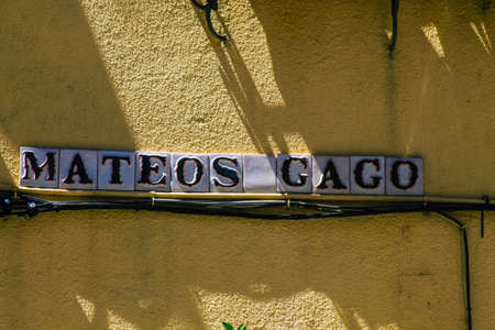 Seville Spain July 06, 2021 Street sign or road sign, erected at the side of or above roads to provide information to road user in the downtown area of Sevilleの写真素材