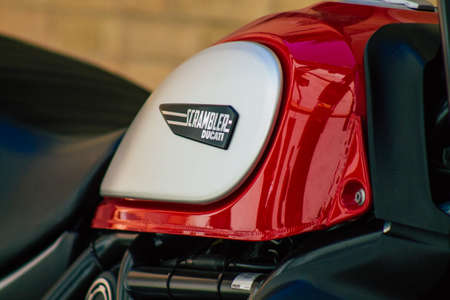 Seville Spain July 06, 2021 Ducati Scrambler motorcycle parked in the streets of Seville, an emblematic city and the capital of the region of Andalusia, in the south of Spainのeditorial素材