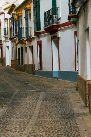 Carmona Spain July 14, 2021 Narrow street in town of Carmona called The Bright Star of Europe, the town shows a typical narrow and meandering Arabic layout which will transport you to a distant pastの写真素材