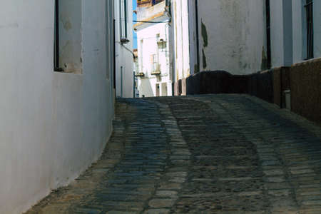 Carmona Spain July 14, 2021 Narrow street in town of Carmona called The Bright Star of Europe, the town shows a typical narrow and meandering Arabic layout which will transport you to a distant pastの写真素材