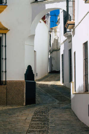 Carmona Spain July 14, 2021 Narrow street in town of Carmona called The Bright Star of Europe, the town shows a typical narrow and meandering Arabic layout which will transport you to a distant pastの写真素材