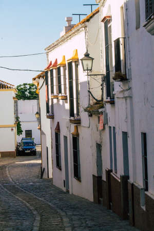 Carmona Spain July 14, 2021 Narrow street in town of Carmona called The Bright Star of Europe, the town shows a typical narrow and meandering Arabic layout which will transport you to a distant pastの写真素材