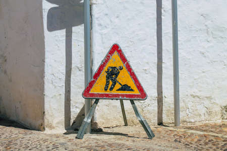 Carmona Spain July 15, 2021 Public works in the streets of Carmona to repair a cable pipe that has broken telephone and fiber optic installationの写真素材