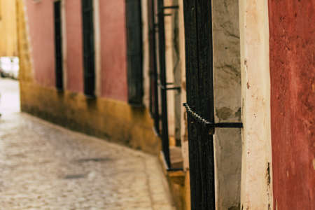 Carmona Spain July 14, 2021 Closeup of a window of a old house in the narrow streets in town of Carmona called The Bright Star of Europe, the town shows a typical narrow and meandering Arabic layoutの写真素材