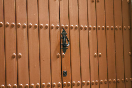 Carmona Spain July 14, 2021 Closeup of a door of a old house in the narrow streets in town of...