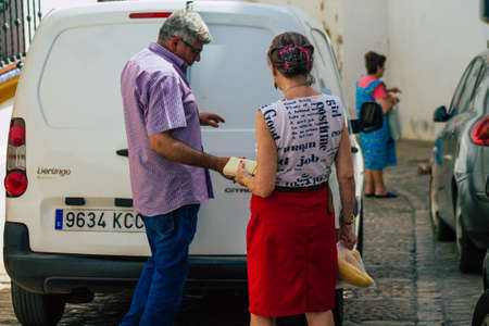 Carmona Spain July 10, 2021 Home bakery delivering bread in the old streets of Carmona in Spain, it is a way to supply the elderly who have difficulty moving, this service is freeのeditorial素材