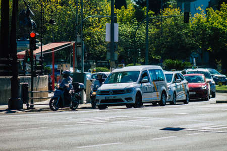 Seville Spain July 09, 2021 Taxi driving through the streets of Seville, an emblematic city and the...