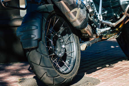 Seville Spain July 09, 2021 Closeup of the mechanics of a motorcycle parked in a parking lot located...