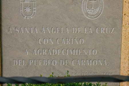 Carmona Spain July 15, 2021 View of the statue of Santa Angela de la Cruz located front the Church of Santa Maria, built mainly in the 15th and 16th centuries on the site of Carmona former mosqueのeditorial素材