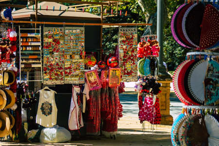 Seville Spain July 10, 2021 Decorative objects and souvenirs sold at Maria Luisa Park in Seville, an...