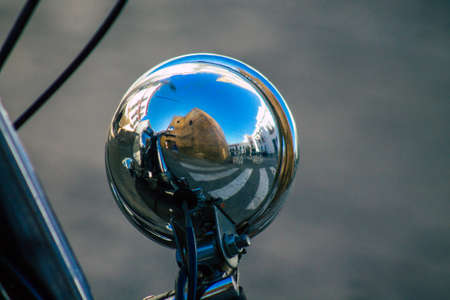 Seville Spain July 14, 2021 Closeup of the mechanics of a motorcycle parked in a parking lot located in the city center of Seville, an emblematic city and the capital of the region of Andalusia, in the south of Spainのeditorial素材