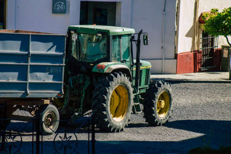 Carmona Spain July 14, 2021 Tractor rolling in the streets of Carmona, an emblematic city and the capital of the region of Andalusia, in the south of Spainのeditorial素材